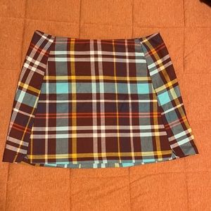 Plaid mini skirt. Size S, snug straight fit.